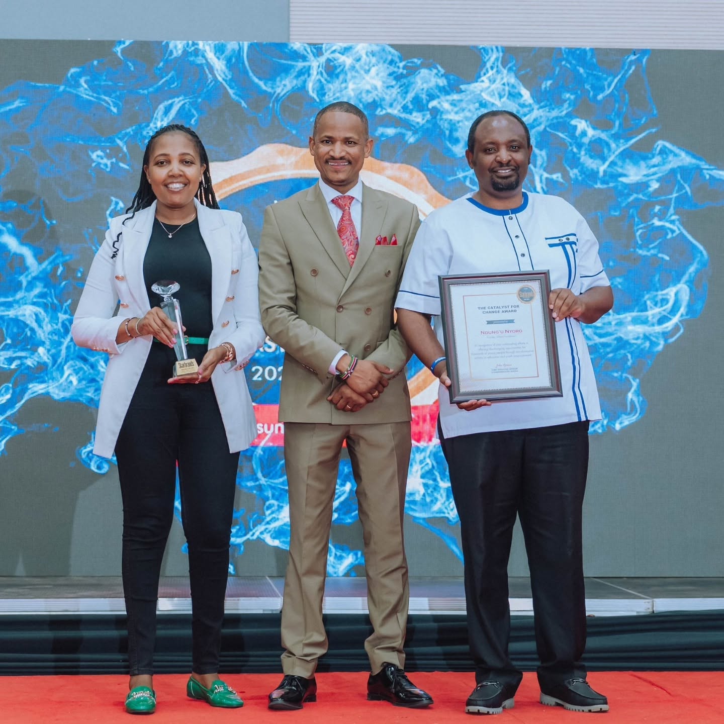 Ndung'u Nyoro receiving award on stage